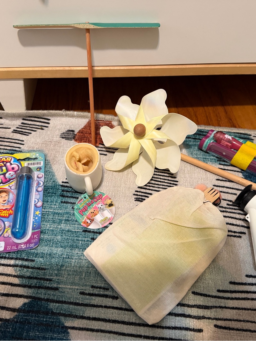 Toys! Grab-a-Bubble, pocket microscope, secret writing kit, pup-in-a-cup ++